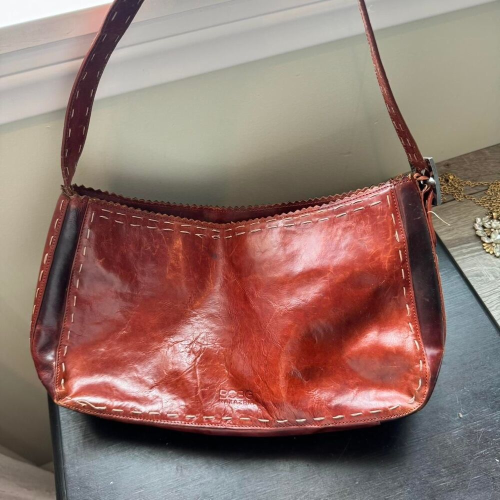 BCBG Vintage leather cognac burgundy broken in